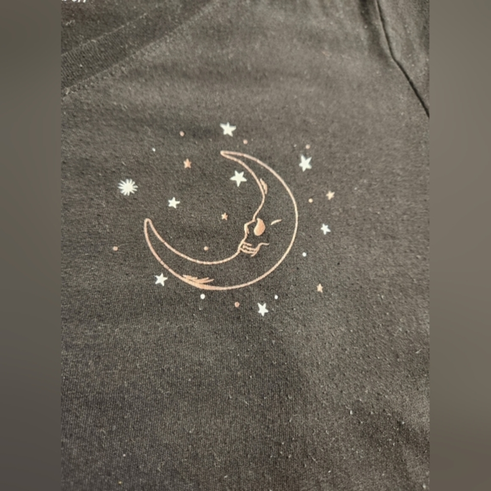 Torrid black tee with moon skull. Size 2